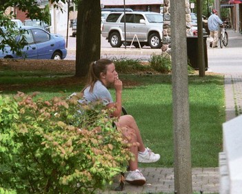 Woman Smoking a Cigarette in Northwest IL, Suburbs