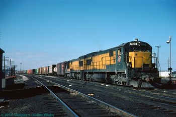 CONRAIL EASTBOUND FREIGHT WITH C&NW GE POWER DEPARTS COLLINWOOD - CLEVELAND, OHIO - MARCH 1977