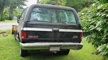 A 1991 GMC JIMMY WITH PLOW IN SEP 2015