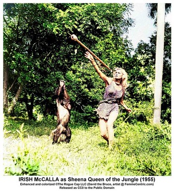 Irish McCalla as Sheena throws spear